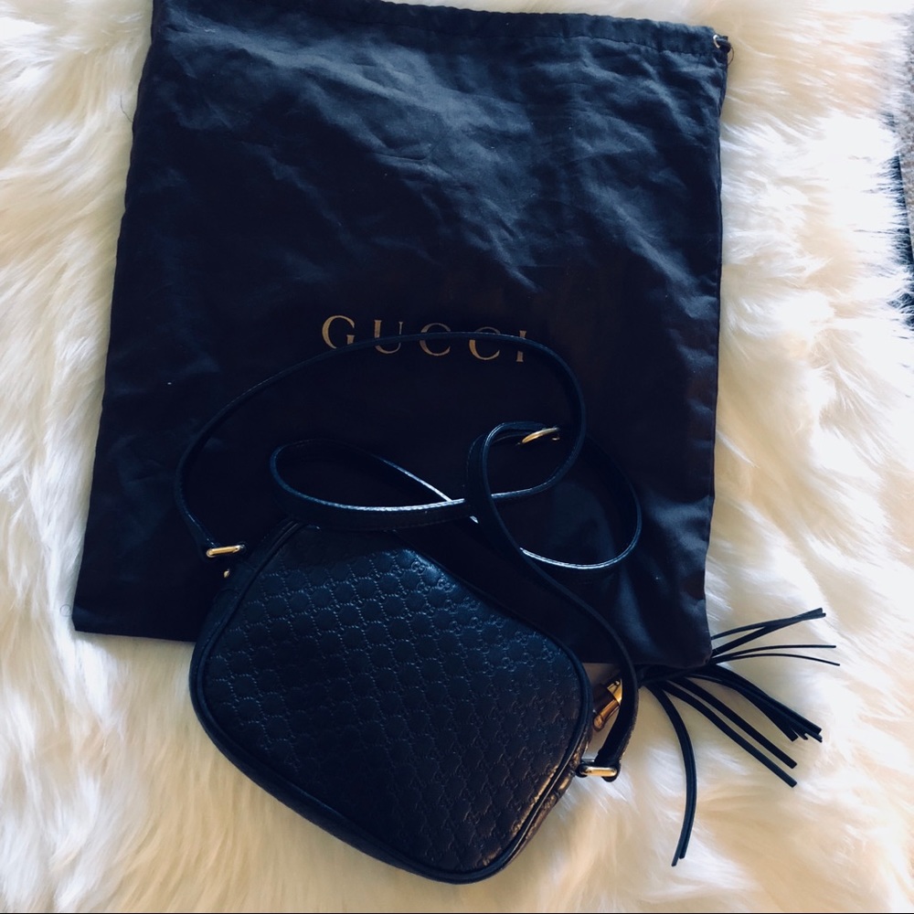 Gucci Microguccissima Crossbody Bag.